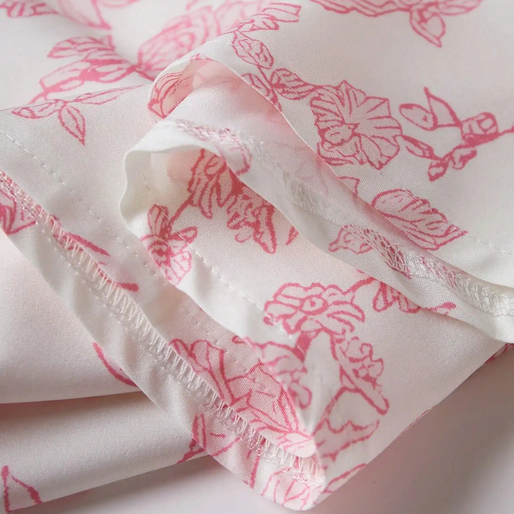 Robe longue florale à bretelles spaghetti et coupe évasée – Modèle Rose