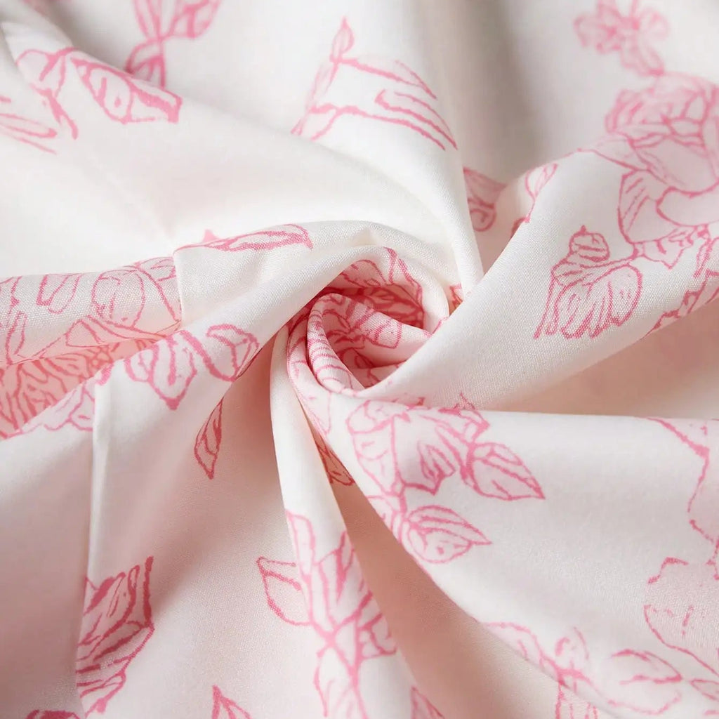 Robe longue florale à bretelles spaghetti et coupe évasée – Modèle Rose