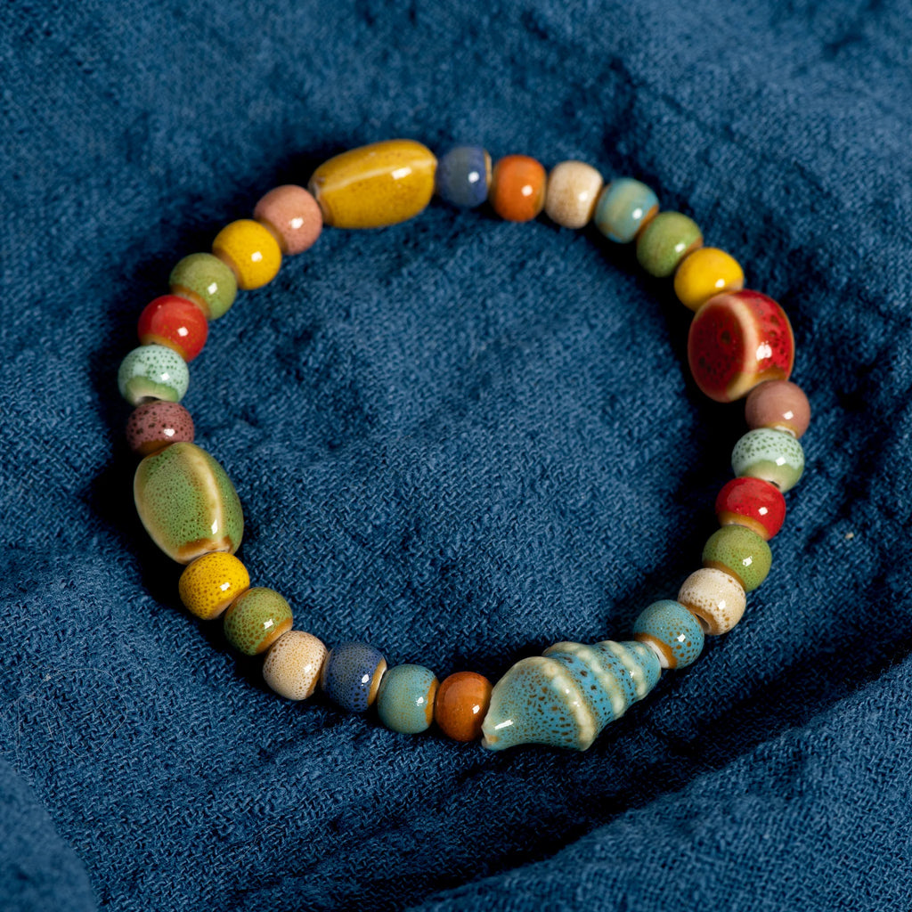 Bracelet de perles en céramique – Motifs étoile de mer et coquillage – Boho Plage