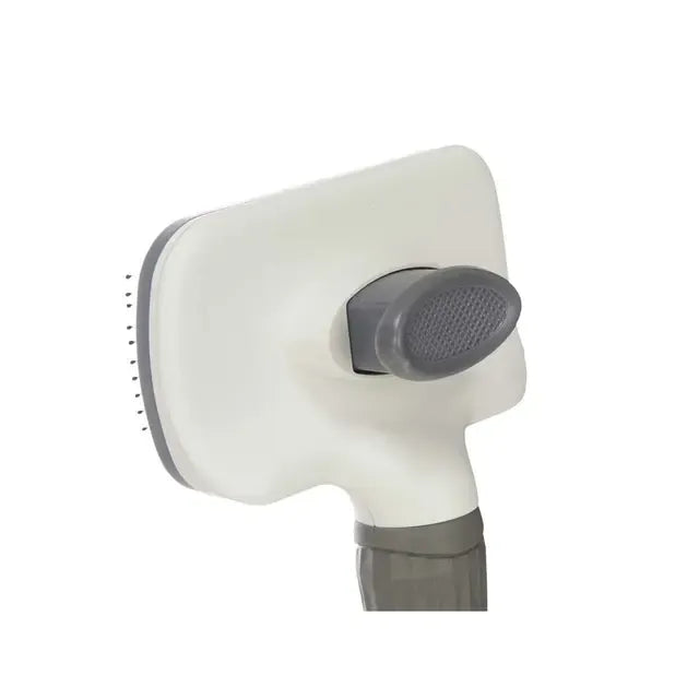 Face arrière de la brosse pour chiens Mascow avec mécanisme de retrait des poils